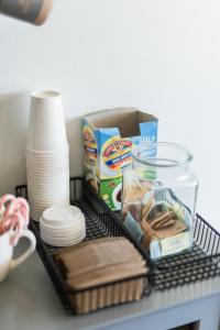 a shelf with food and other items on a table at Happy Trails BnB in Tropic