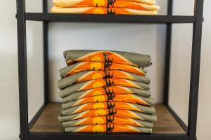 a shelf with cushions and towels on it at Happy Trails BnB in Tropic