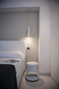 Postel nebo postele na pokoji v ubytování Hotel Villa Felice Relais