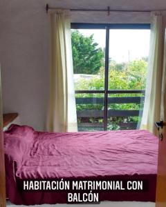 Ένα ή περισσότερα κρεβάτια σε δωμάτιο στο Complejo “El Límite”