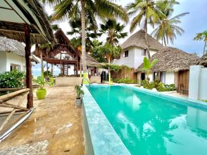 Kolam renang di atau dekat dengan Jambiani White Sands Bungalows