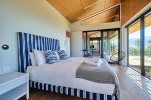 Voodi või voodid majutusasutuse On The Edge Luxury toas