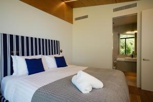 Voodi või voodid majutusasutuse On The Edge Luxury toas
