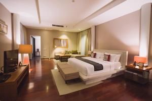 Ein Bett oder Betten in einem Zimmer der Unterkunft Javana Royal Villas