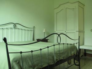 Tempat tidur dalam kamar di Torre del Sogno