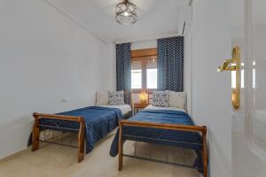Postel nebo postele na pokoji v ubytování Soleadore Sol + 4 fotografie
