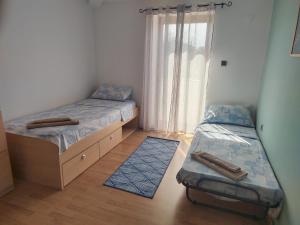 Postel nebo postele na pokoji v ubytování Manuela