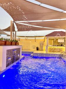 Bazén v ubytování AlDana Resort & Hotels nebo v jeho okolí