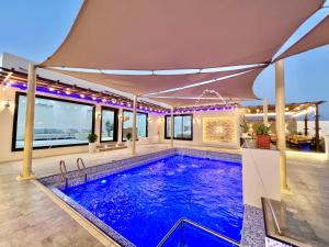 Bazén v ubytování AlDana Resort & Hotels nebo v jeho okolí