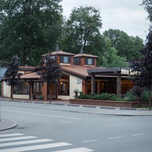 a house on the side of a street at Domi Lini in Druskininkai