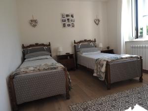 A bed or beds in a room at Casa vacanze Lepa Vida