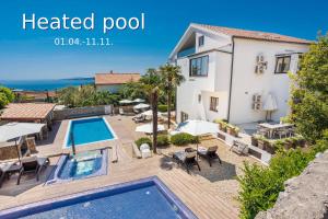 an image of a villa with a swimming pool at Villa Palma Krk in Krk