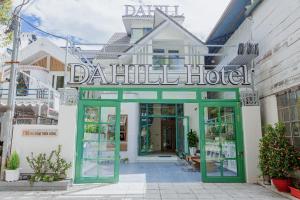 a door to a dahlled hotel with a sign above it at Dahill 196 Dalat in Da Lat +75 photos