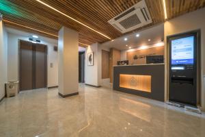 a lobby with a large screen in a building at Hotel Centro Stay in Incheon