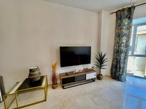 Telewizja i/lub zestaw kina domowego w obiekcie Suite la Perla