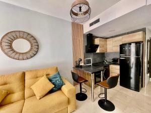 A kitchen or kitchenette at Suite la Perla