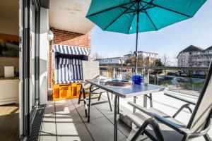 Balkón nebo terasa v ubytování Haus Strandläufer Apartment 1 6 DeichLounge