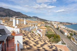 - une vue sur la ville depuis le toit d'un bâtiment dans l'établissement Fuengirola apartment close to the beach Ref 06, à Torremolinos