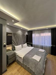 Postel nebo postele na pokoji v ubytování Istanbul Suites Residance Super Lux 2+1/B