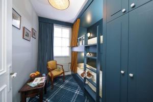 Posezení v ubytování Le Manoir Hôtel