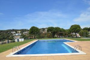 Bazén v ubytovaní Club Villamar - Cala Llevado 40 alebo v jeho blízkosti