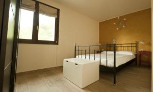 Voodi või voodid majutusasutuse Agriturismo Deviscio toas