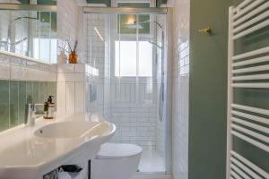 Koupelna v ubytování Ama Hôtel + 28 fotografií