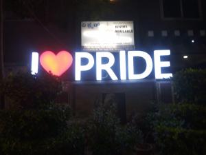 a i heart pride sign on a building at night at PRIDE MANYATA in Bangalore