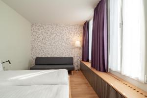 Linde Heiden Swiss Quality Hotel客房内的一张或多张床位