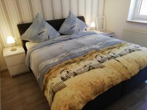 Postel nebo postele na pokoji v ubytování Ferienwohnung Netty