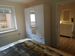 Postel nebo postele na pokoji v ubytování Ferienwohnung Netty