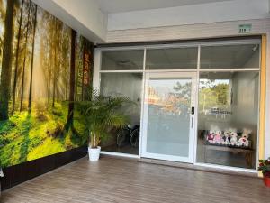 a store front with a sliding glass door at Five Rabbits in Chaozhou