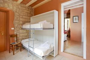 Voodi või voodid majutusasutuse Albergo Garni Orchidea toas