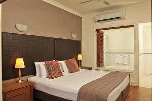 Letto o letti in una camera di Mantra on the Inlet