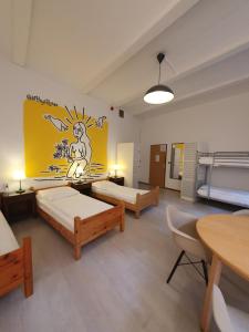 Postel nebo postele na pokoji v ubytování Die Fabrik - Hostel