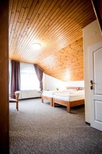 Postel nebo postele na pokoji v ubytování Hotel Squash Centrum