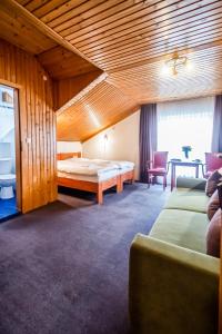 Postel nebo postele na pokoji v ubytování Hotel Squash Centrum