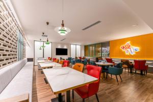 TV a/nebo společenská místnost v ubytování Houhai Hotel