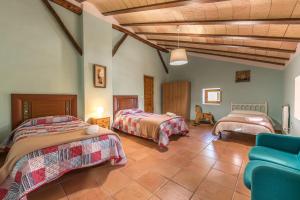 Postel nebo postele na pokoji v ubytování Rapia. Casa Rosa 2 + 6 fotografií