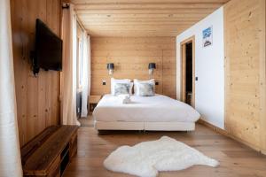 Posteľ alebo postele v izbe v ubytovaní Luxury Wood Megeve village