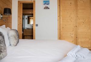 Posteľ alebo postele v izbe v ubytovaní Luxury Wood Megeve village