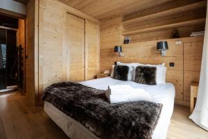 Posteľ alebo postele v izbe v ubytovaní Luxury Wood Megeve village