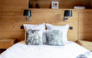 Posteľ alebo postele v izbe v ubytovaní Luxury Wood Megeve village