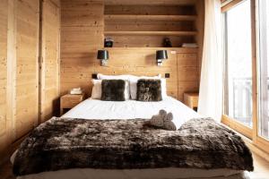 Posteľ alebo postele v izbe v ubytovaní Luxury Wood Megeve village