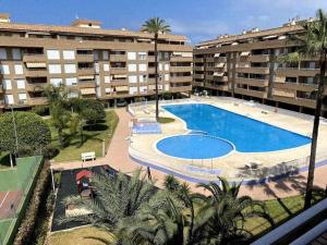 Bazén v ubytovaní Precioso apartamento en Urbanización Puerto Romano alebo v jeho blízkosti
