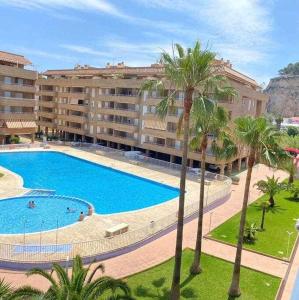Bazén v ubytovaní Precioso apartamento en Urbanización Puerto Romano alebo v jeho blízkosti