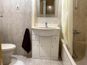 Kúpeľňa v ubytovaní Precioso apartamento en Urbanización Puerto Romano