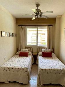 Posteľ alebo postele v izbe v ubytovaní Precioso apartamento en Urbanización Puerto Romano