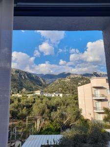 a view of the mountains from a building at Anxhelos Hotel in Himare