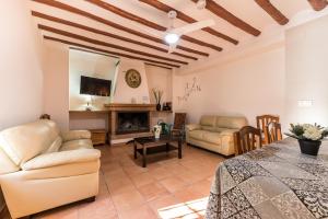 Posezení v ubytování Rapia. Casa Rosa 2